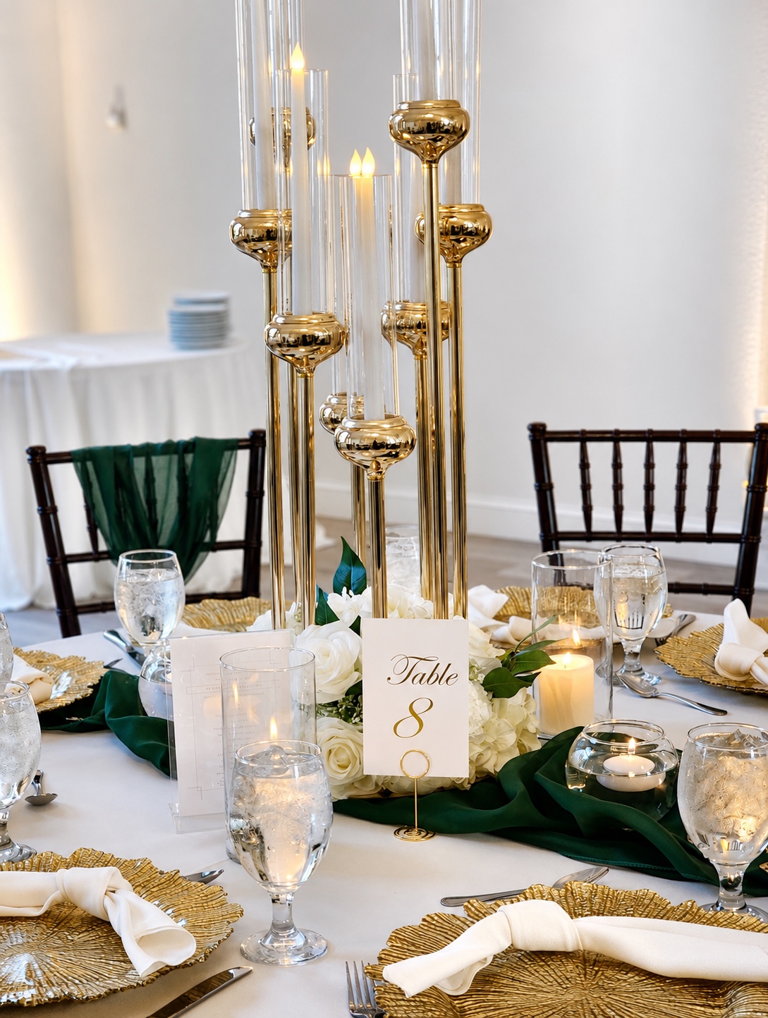 Emerald, ivory, and gold wedding reception tablescape styled by LOL Creative Events